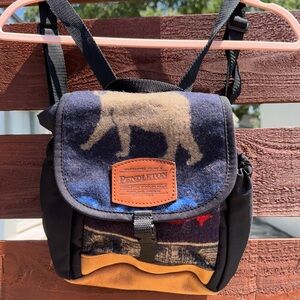 Pendleton mini backpack with bear/salmon wool
USA